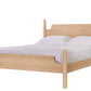 A light Maple wood bed frame with a matching headboard and footboard, styled with white bedding and two pillows, isolated on a white background.