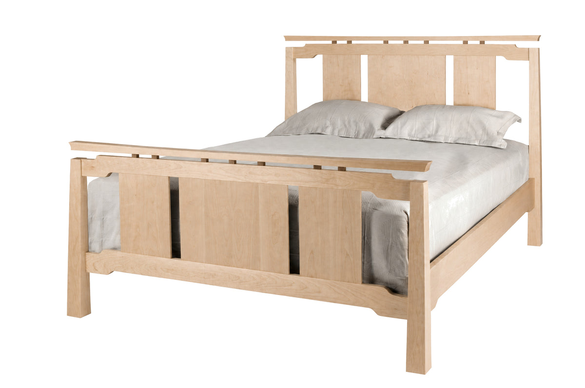 An Asian inspired bed with a Maplewood frame and headboard, dressed in white bedding and two white pillows, shown against a plain white background.