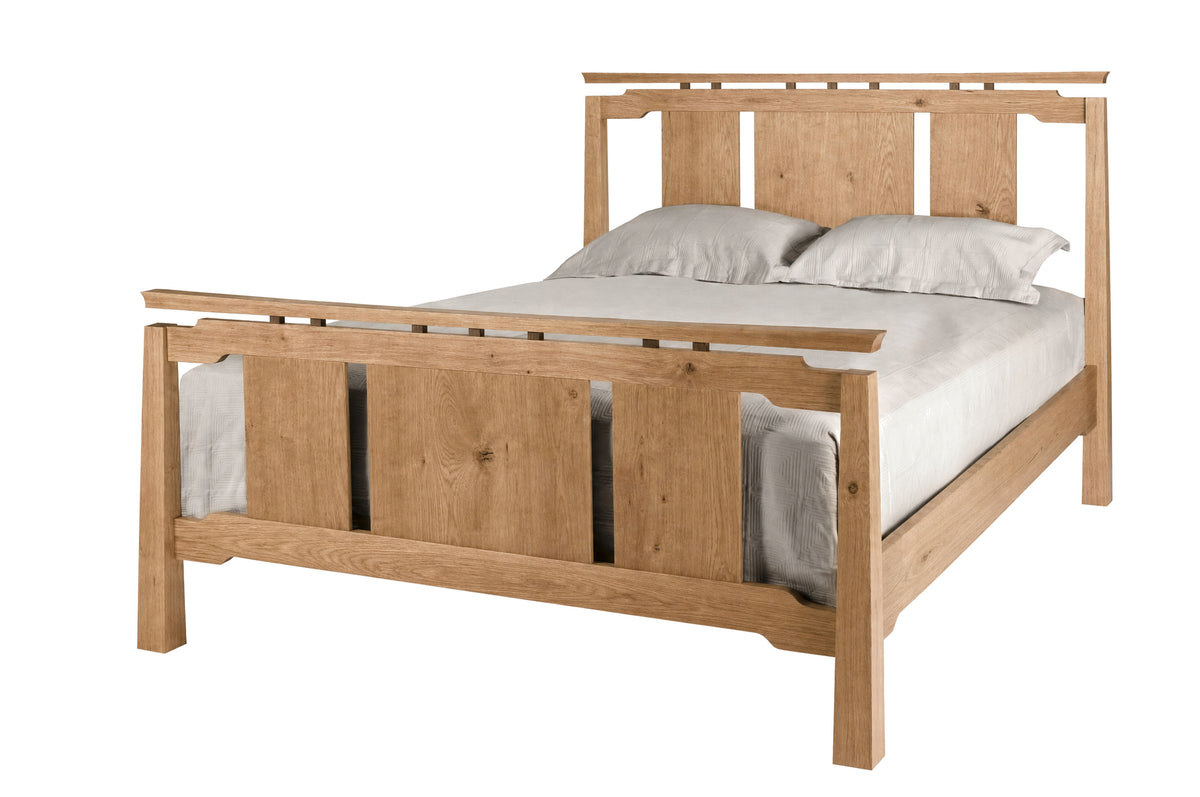 An Asian inspired bed with an Oak wood frame and headboard, dressed in white bedding and two white pillows, shown against a plain white background.