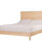 A light Maple wood platform bed frame with a tall rectangular headboard, shown with white bedding and two white pillows on a plain white background.