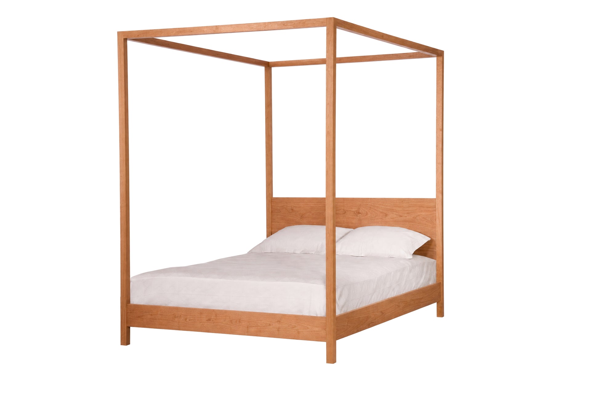 A Cherry wood four-poster bed frame with a white mattress and two white pillows, shown against a solid white background.