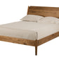A mid-century modern Walnut wooden bed frame with a warm medium-brown finish, styled with a cream-colored mattress and two matching pillows, shown against a solid white background.