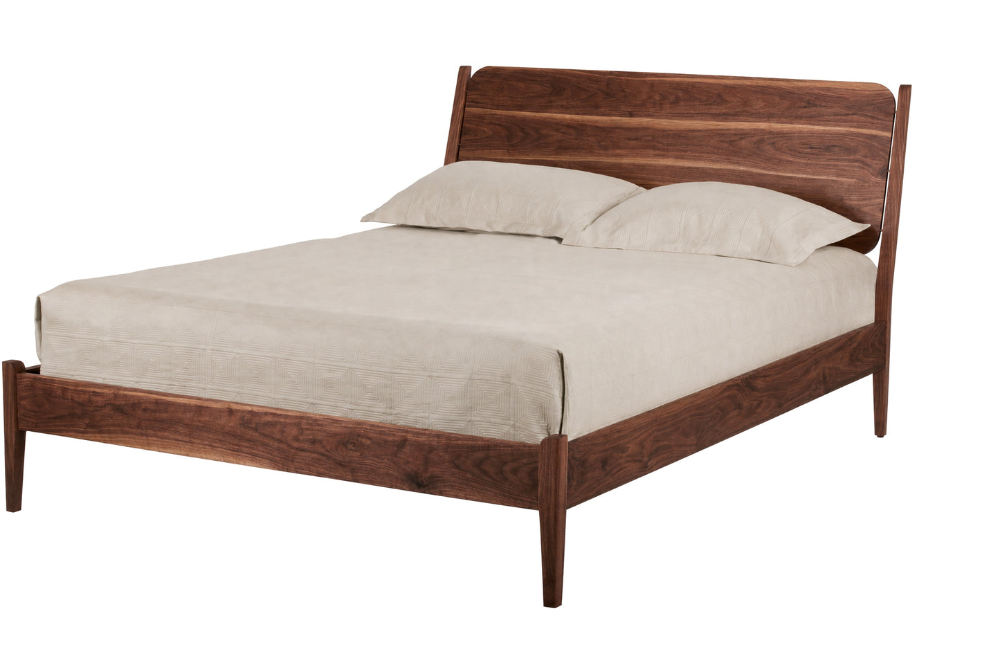 A mid-century modern Walnut wooden bed frame, styled with a cream-colored mattress and two matching pillows, shown against a solid white background.