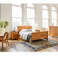 Dunning Nightstand with Door and Drawer in Cherry with the Contemporary Sleigh
