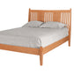 Contemporary Cherry wood bed with slats and panels on headboard. Featuring light toned bedding and matching pillows on white background. 