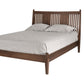 Contemporary Walnut wood bed with slats and panels on headboard. Featuring light toned bedding and matching pillows on white background. 