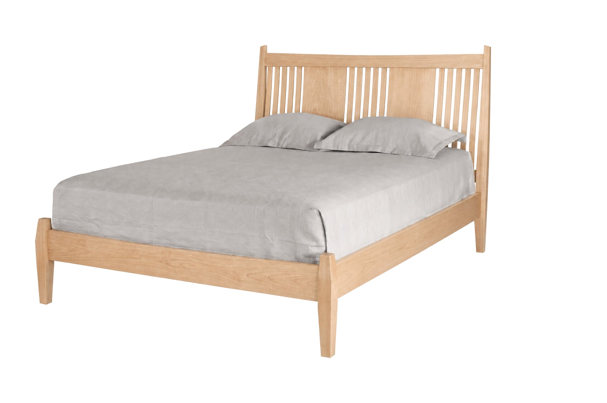 Contemporary Maple wood bed with slats and panels on headboard. Featuring light toned bedding and matching pillows on white background. 