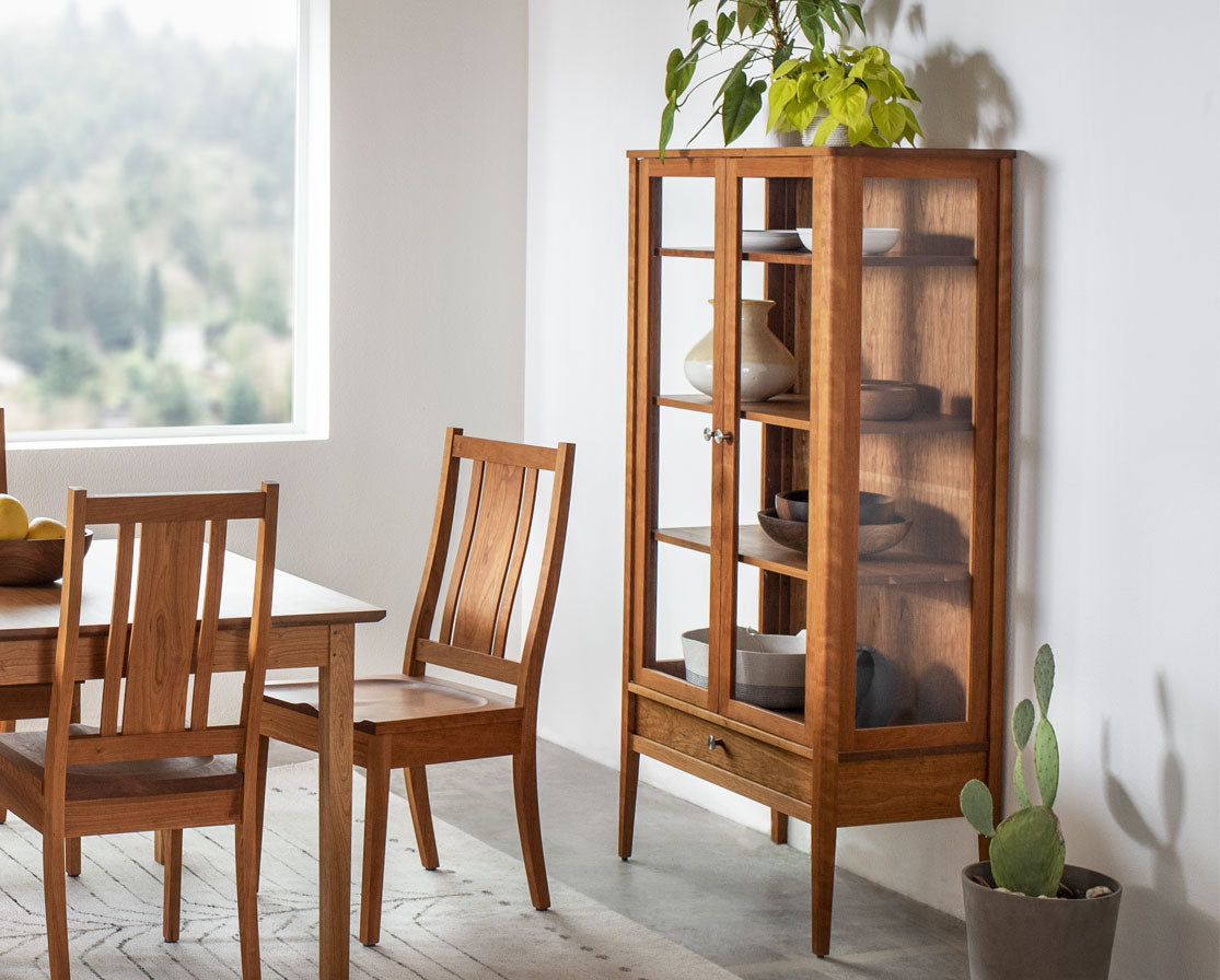 Whitman Curio in Cherry with Kenton side chairs and Shaker dining table