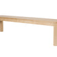 A light natural wood bench with a rectangular seat and four sturdy legs, shown from a three-quarters angle on a solid white background.