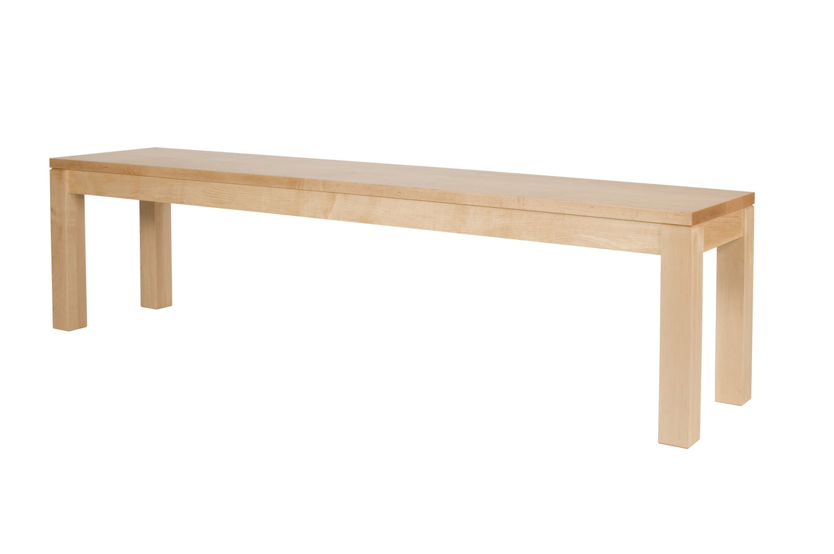 A light natural wood bench with a rectangular seat and four sturdy legs, shown from a three-quarters angle on a solid white background.