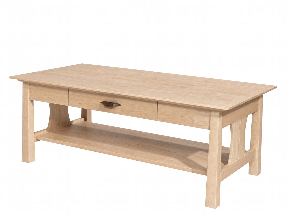 A light Maple wood coffee table with a single drawer featuring a dark wood pull handle, an open lower shelf, and a rectangular top, shown on a plain white background.