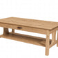 A light oak wood coffee table with a single drawer featuring a dark wood pull handle, an open lower shelf, and a rectangular top, shown on a plain white background.