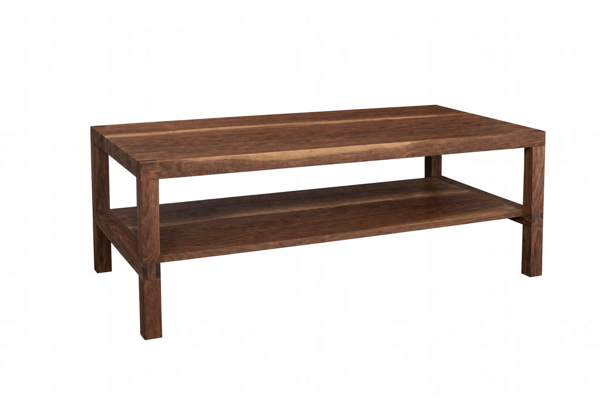 A rectangular wooden coffee table with a dark brown finish, featuring a top surface and a lower shelf, shown against a plain white background.