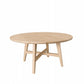 A round light Maple wood coffee table with tapered legs and a central crossbar, shown on a solid white background.