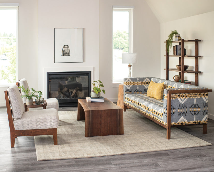 Slipper Chair in Eastern Walnut with Celilo Sofa and Live Edge miter wrap coffee table