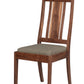 A wooden dining chair with a medium brown wood frame and a textured gray upholstered seat cushion, shown against a plain white background.