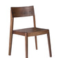 A modern wooden dining chair with a warm medium-brown finish, featuring a backrest and four tapered legs, shown against a plain white background.