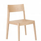 A minimalist light natural wood dining chair with a simple rectangular backrest and tapered legs, shown against a plain white background.