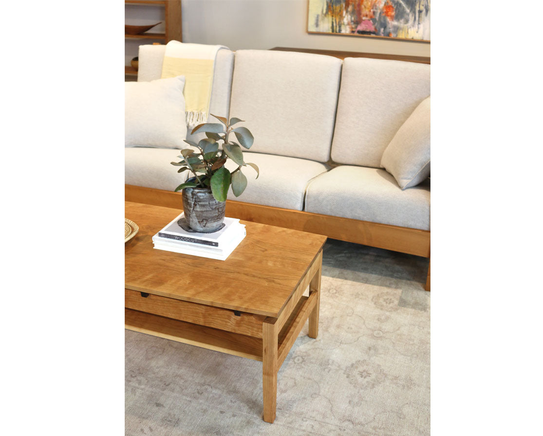 Hochberg Coffee Table in Cherry with Western Walnut risers with Pacific Couch