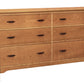 A six-drawer wooden dresser with a warm Cherry finish and dark wood drawer pulls, shown on a plain white background.