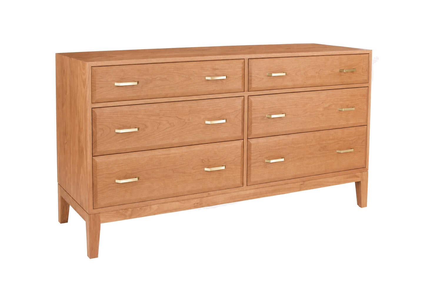A contemporary wooden dresser with a Cherry finish and brass pulls, shown from a three-quarter angle on a white background.