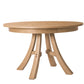 A round wooden dining table with a natural oak finish, featuring a thick round tabletop and three curved legs joined by a central stretcher, shown on a solid white background.