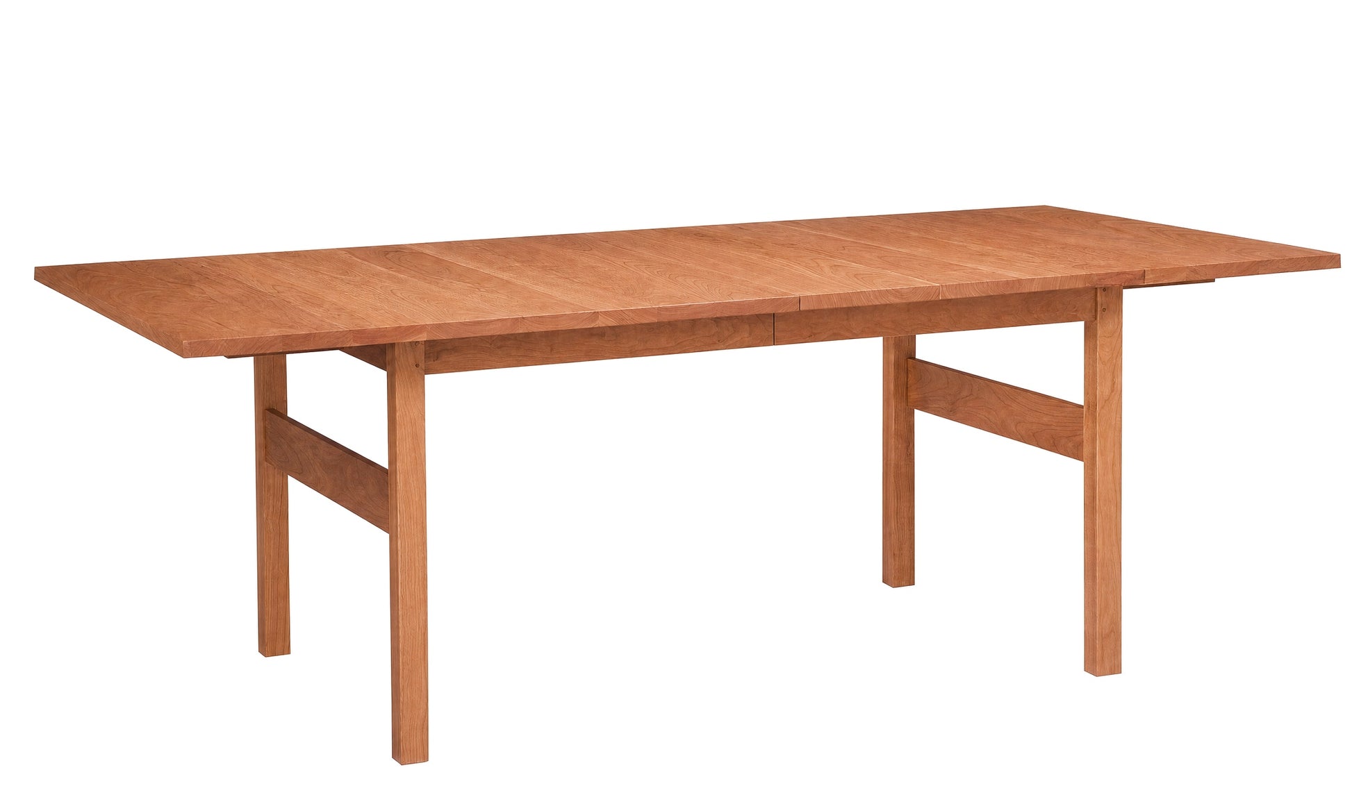 A Cherry wooden dining table with a rectangular top, visible wood grain, and four legs with stretcher supports, shown on a plain white background.
