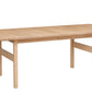 A light Maple wood extendable dining table with a minimalist design, shown on a solid white background.