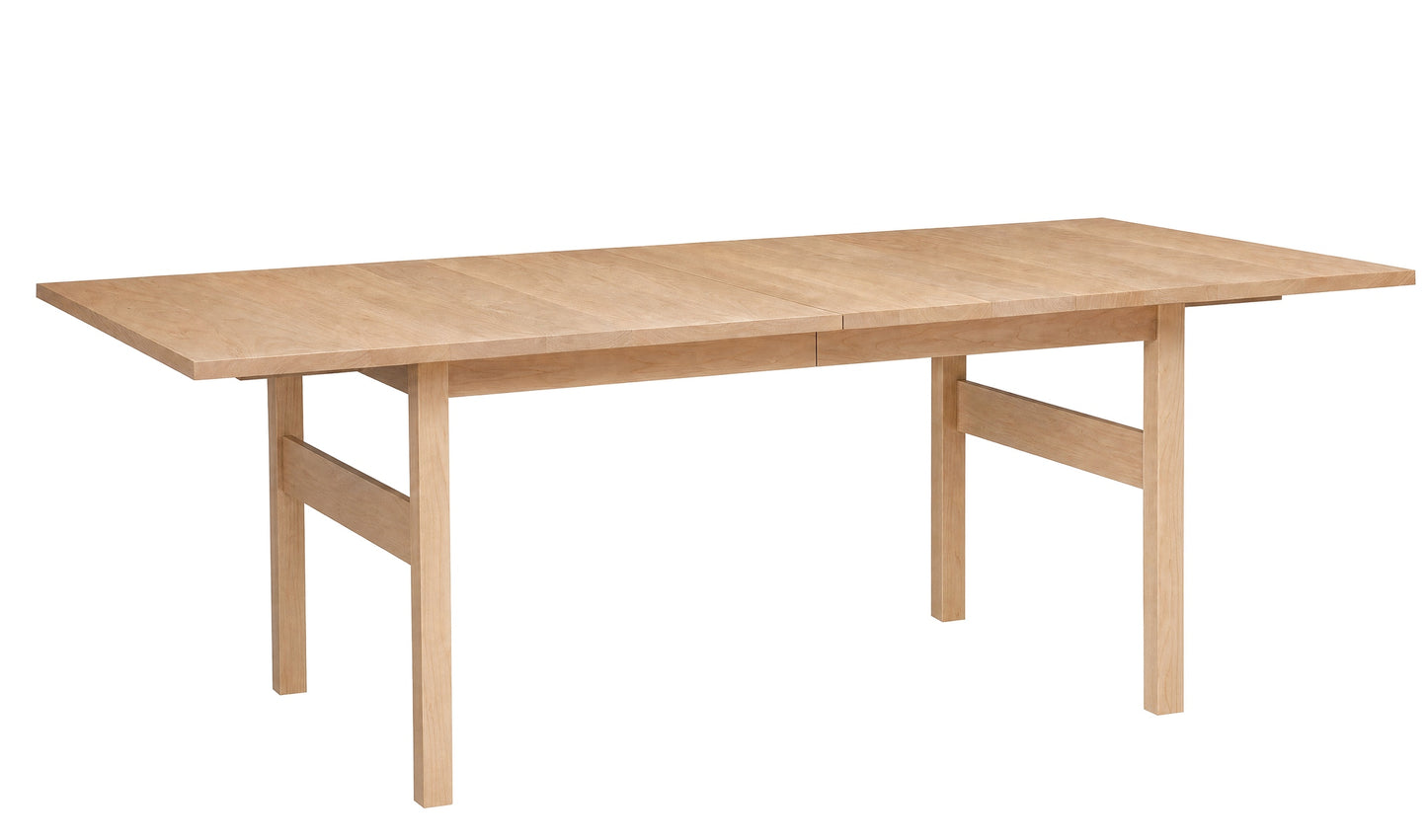 A light Maple wood extendable dining table with a minimalist design, shown on a solid white background.