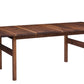 A dark Walnut wooden extendable dining table with a rich wood grain finish and four legs, shown on a plain white background.