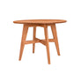 A round Cherry wooden dining table with four angled legs and a central crossbar, shown on a plain white background.