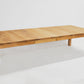 Wooden dining table on a white background