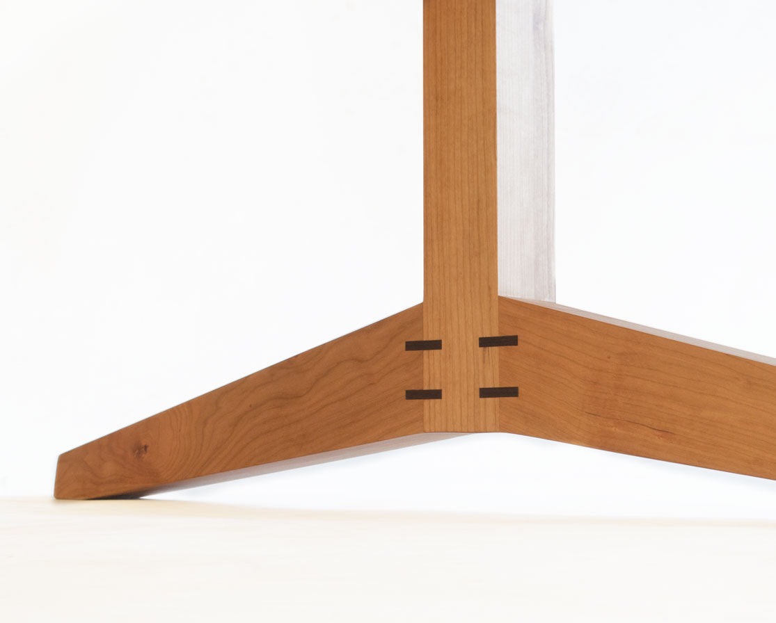 Hayden leg detail in Cherry with Western Walnut details