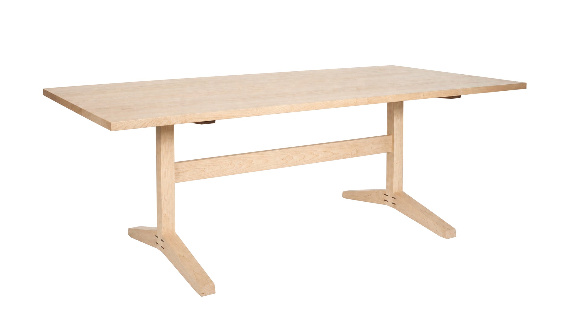 A light natural wood dining table with a rectangular top and two angled A-frame legs connected by a central support beam, shown on a plain white background.