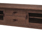 A dark brown wooden TV stand or media console with two drawers in the center and two glass-front cabinet doors on the sides, shown on a plain white background.