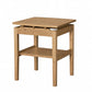 A light oak wood lift-top side table with a lower shelf, shown on a solid white background.