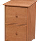 A two-drawer wooden file cabinet warm natural Cherry finish, featuring round wooden knobs and a slightly tapered top, shown against a plain white background.