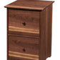 A two-drawer wooden file cabinet warm natural walnut finish, featuring round wooden knobs and a slightly tapered top, shown against a plain white background.