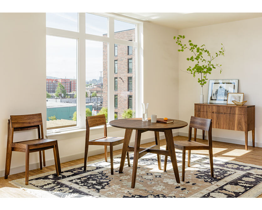 Klamath Dining Table in Eastern Walnut with Klamath chairs and sideboard.