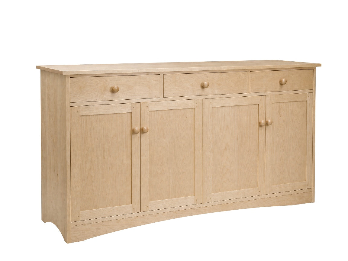 A light natural wood sideboard cabinet with three drawers on top and three paneled doors below, featuring small round wooden knobs, shown on a plain white background.