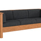 A three-seater wooden sofa with dark charcoal gray textured cushions, shown from a three-quarter angle on a solid white background.