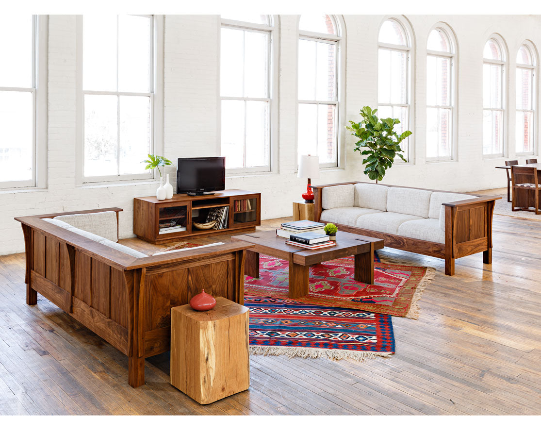 Arcadia Coffee Table in Eastern Walnut with Settle Sofas and Century End Table